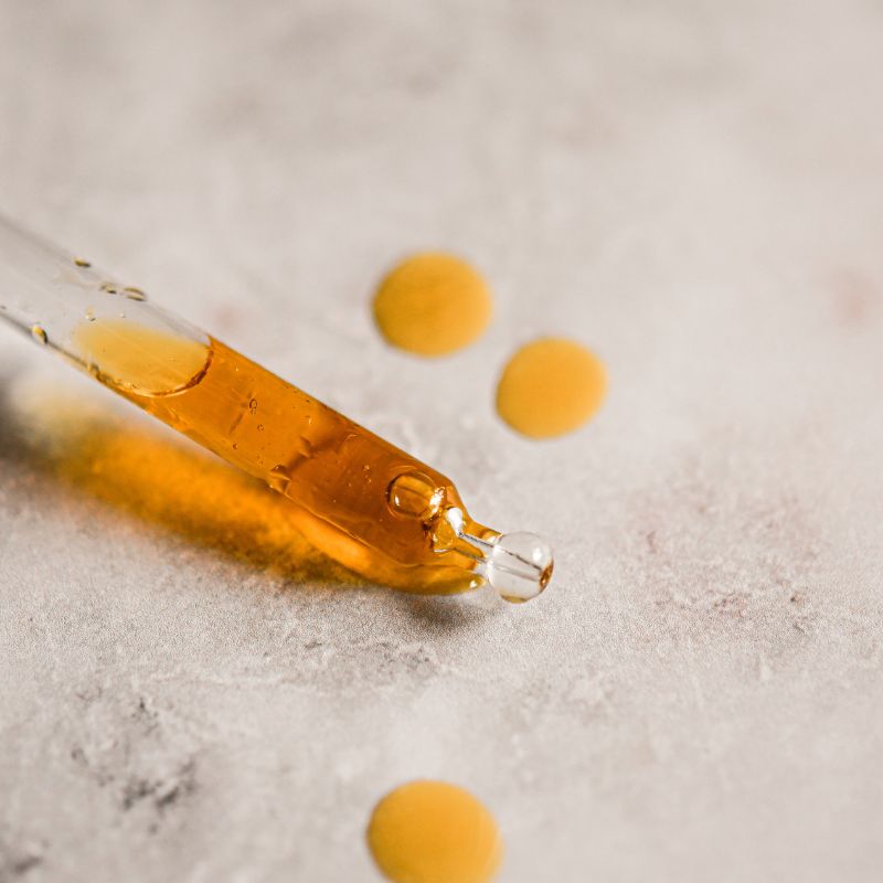 Cold pressed organic oil in a biophotonic glass bottle — Niki Newd waterless skincare formulated without added water for maximum potency and minimal preservatives